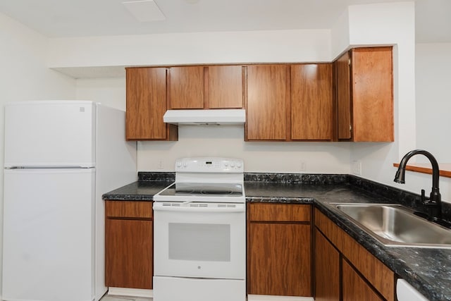 kitchen with white appliances and sink