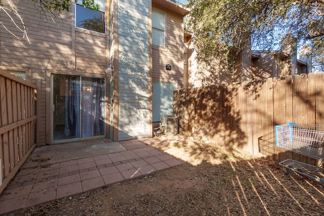 back of property with a patio area