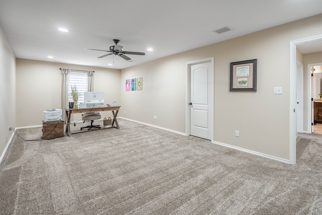 office with ceiling fan and carpet floors