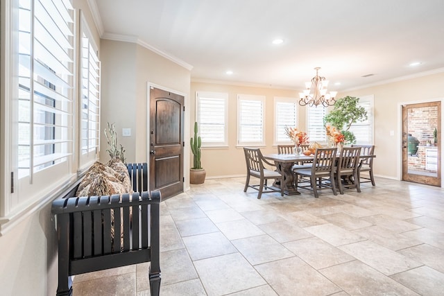 dining area with ornamental molding and a wealth of natural light