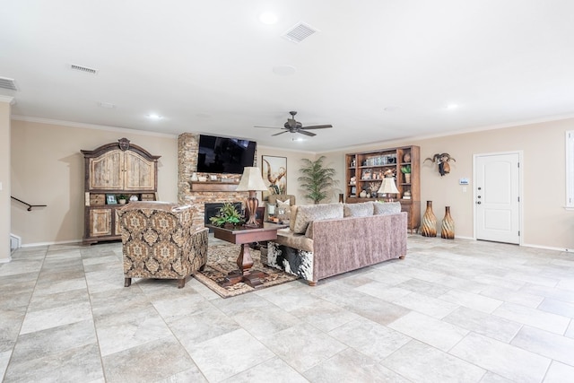 living room featuring a stone fireplace, ornamental molding, and ceiling fan