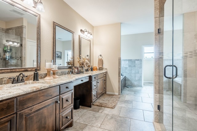 bathroom with plus walk in shower and vanity