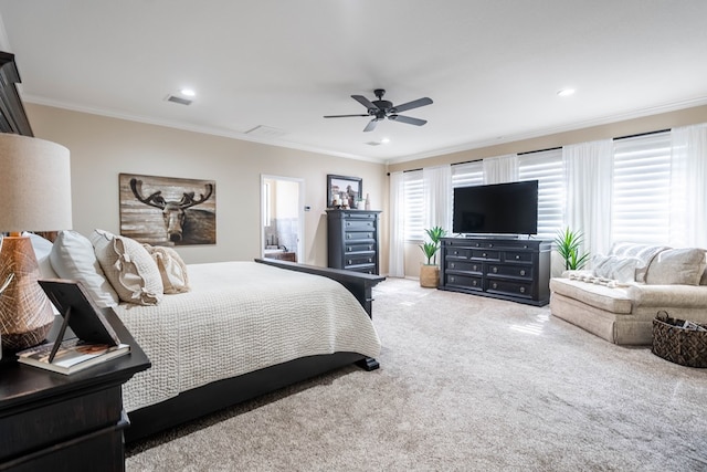 carpeted bedroom featuring multiple windows, ornamental molding, and ceiling fan