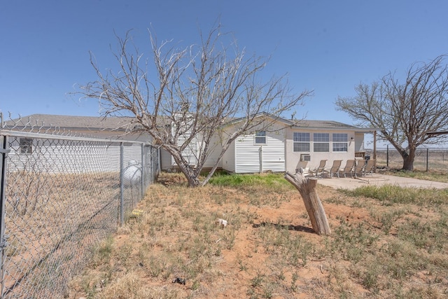 6308 S County Rd 1182, Midland, TX 79706 - view of front of house featuring fence and a patio area