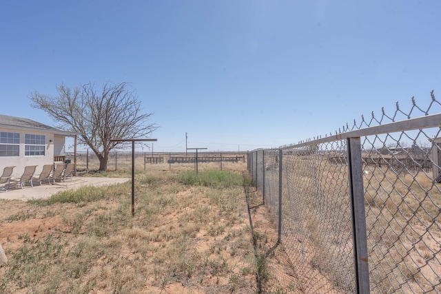 6308 S County Rd 1182, Midland, TX 79706 - view of yard featuring fence and a patio area