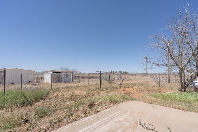 6308 S County Rd 1182, Midland, TX 79706 - view of yard with fence and a rural view