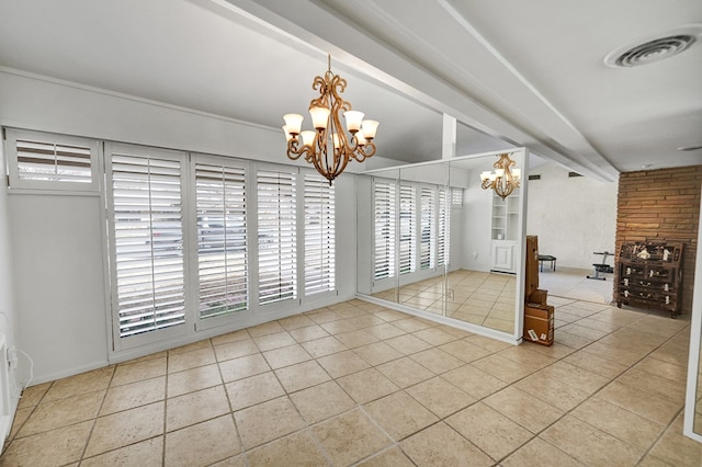 unfurnished dining area with an inviting chandelier, visible vents, beam ceiling, and tile patterned floors