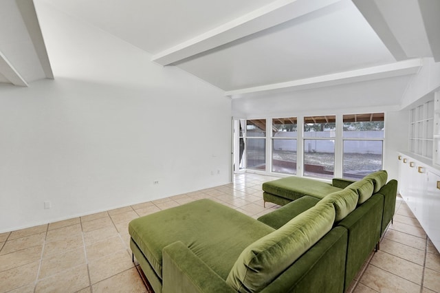 living room with vaulted ceiling with beams and tile patterned floors