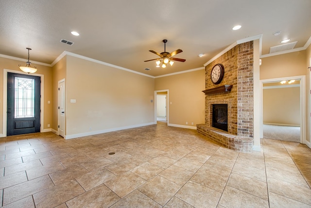 unfurnished living room featuring a fireplace, a ceiling fan, visible vents, baseboards, and ornamental molding