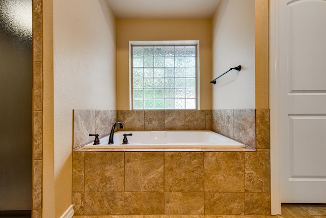 bathroom featuring a bath