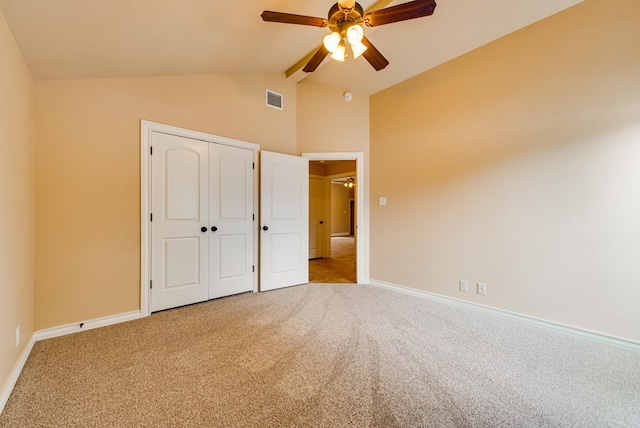 unfurnished bedroom featuring visible vents, vaulted ceiling with beams, carpet floors, and baseboards