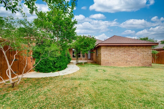 view of yard with fence