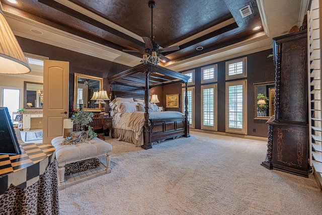 carpeted bedroom with crown molding and recessed lighting
