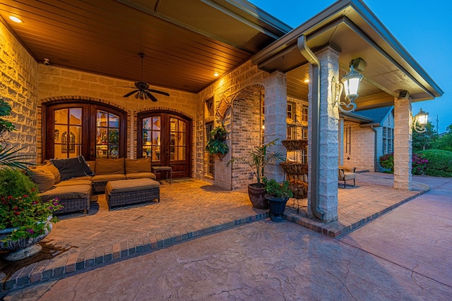 view of patio / terrace featuring french doors, ceiling fan, and an outdoor living space