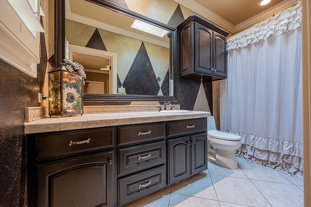 full bathroom with ornamental molding, toilet, tile patterned floors, vanity, and curtained shower