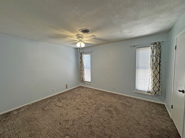3619 W Wadley Ave, Midland, TX 79707 - unfurnished room with carpet floors, a textured ceiling, and a ceiling fan