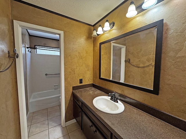 3619 W Wadley Ave, Midland, TX 79707 - full bathroom featuring vanity, a textured ceiling, tile patterned floors, ornamental molding, and bathing tub / shower combination