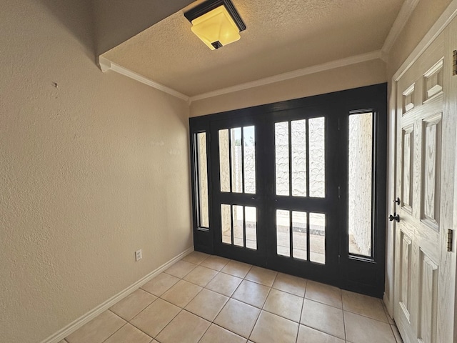 3619 W Wadley Ave, Midland, TX 79707 - foyer entrance featuring a textured ceiling, light tile patterned floors, a textured wall, and crown molding