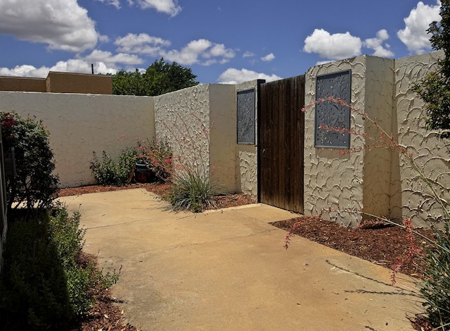 3619 W Wadley Ave, Midland, TX 79707 - view of patio / terrace featuring a fenced front yard and a gate