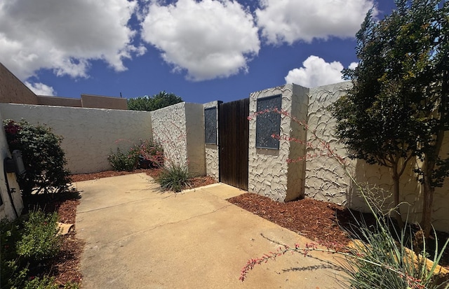 3619 W Wadley Ave, Midland, TX 79707 - view of patio / terrace with a fenced front yard and a gate