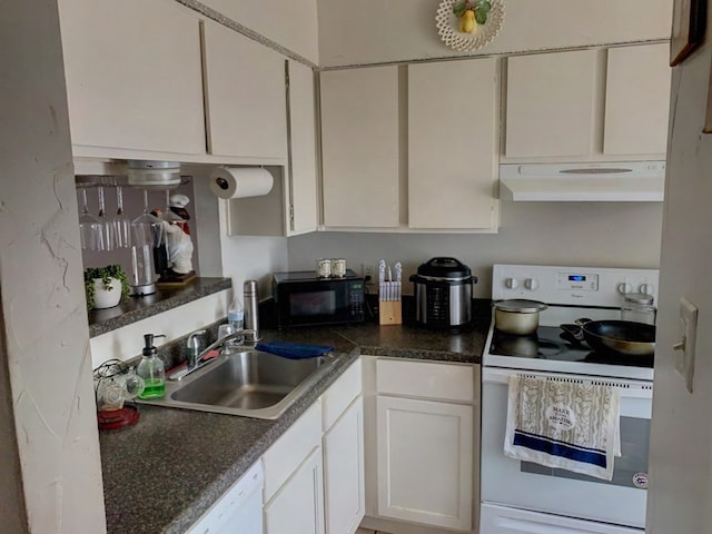 kitchen featuring white cabinetry, white appliances, and sink