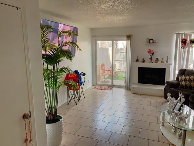 living room featuring a textured ceiling