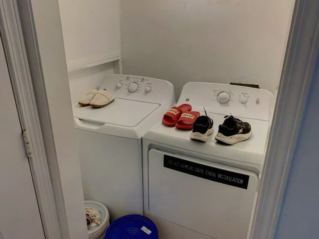 laundry area featuring washing machine and dryer