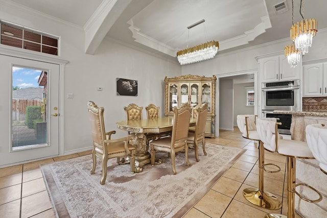4626 Crockett Ave, Midland, TX 79703 - dining space featuring ornamental molding, light tile patterned flooring, visible vents, and a notable chandelier