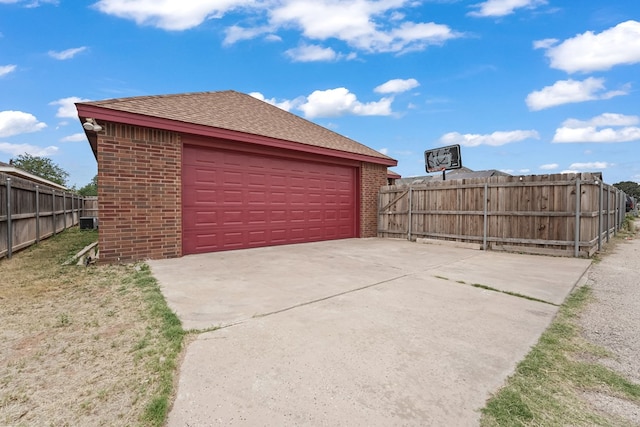 4626 Crockett Ave, Midland, TX 79703 - detached garage featuring fence and central AC unit