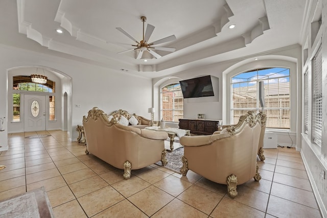 4626 Crockett Ave, Midland, TX 79703 - living room with light tile patterned floors, recessed lighting, ceiling fan, and a raised ceiling