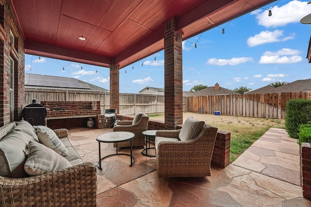 4626 Crockett Ave, Midland, TX 79703 - view of patio featuring an outdoor living space and a fenced backyard