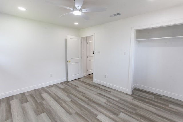 2702 Ann Dr, Big Spring, TX 79720 - unfurnished bedroom with light wood-style floors, recessed lighting, a ceiling fan, and a closet