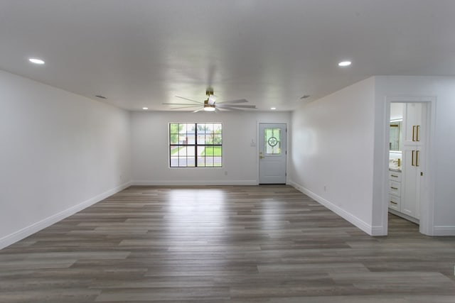 2702 Ann Dr, Big Spring, TX 79720 - unfurnished living room featuring ceiling fan, wood finished floors, and recessed lighting