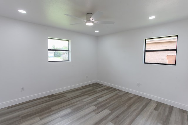 2702 Ann Dr, Big Spring, TX 79720 - unfurnished room with wood finished floors, a ceiling fan, and recessed lighting