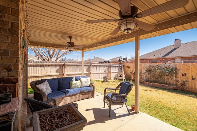 view of patio featuring an outdoor living space and ceiling fan