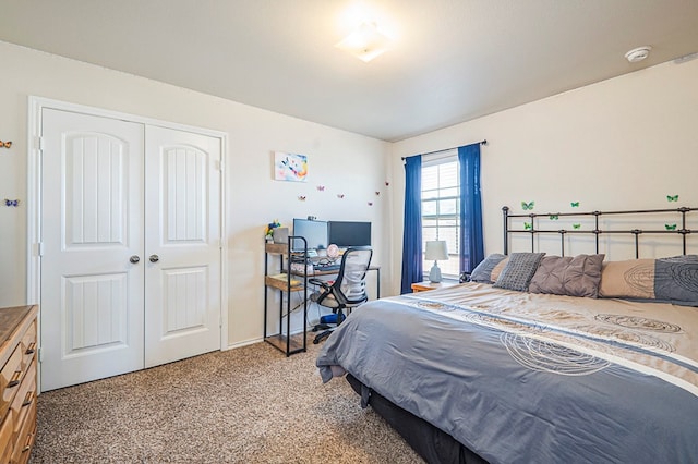 carpeted bedroom with a closet