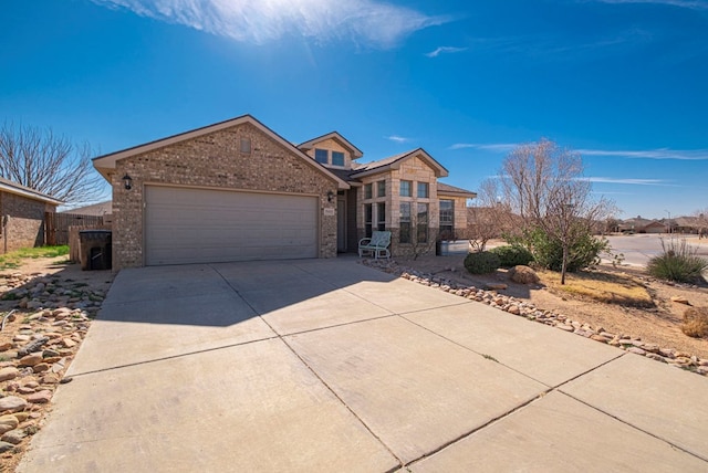 ranch-style home featuring a garage