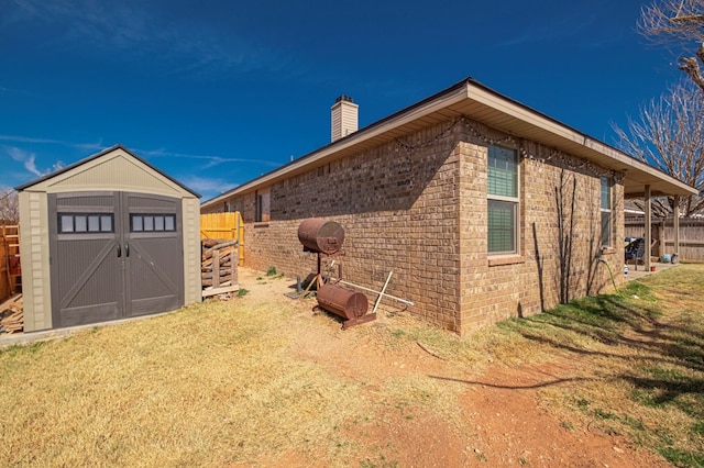 view of property exterior with a storage shed