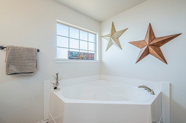 bathroom with a washtub