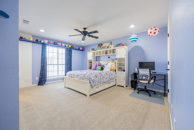 bedroom with light colored carpet, visible vents, ceiling fan, and recessed lighting