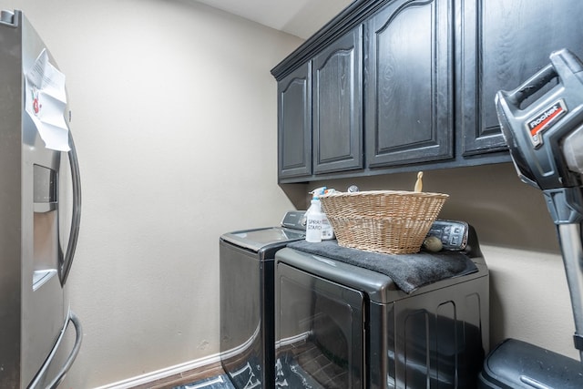 5305 Deer Run, Midland, TX 79707 - laundry room featuring cabinet space and washer and dryer