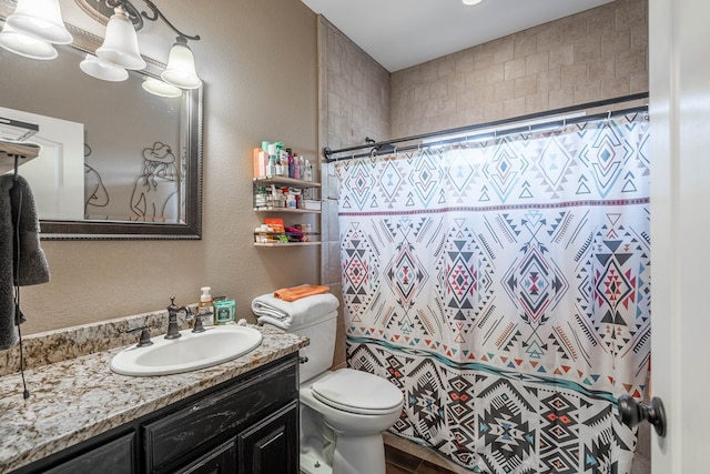 5305 Deer Run, Midland, TX 79707 - full bathroom featuring vanity, a textured wall, toilet, and a shower with curtain