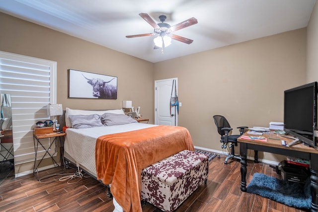 5305 Deer Run, Midland, TX 79707 - bedroom with dark wood-style flooring, an office area, baseboards, and ceiling fan