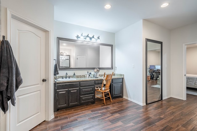 5305 Deer Run, Midland, TX 79707 - full bath featuring wood finished floors, double vanity, ensuite bath, and recessed lighting