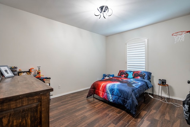 5305 Deer Run, Midland, TX 79707 - bedroom featuring dark wood finished floors and baseboards