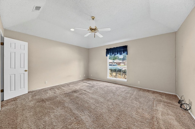 2209 Southampton Ln, Midland, TX 79705 - carpeted empty room featuring ceiling fan and a textured ceiling