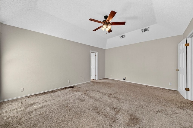 2209 Southampton Ln, Midland, TX 79705 - unfurnished room featuring ceiling fan, carpet floors, vaulted ceiling, and a textured ceiling