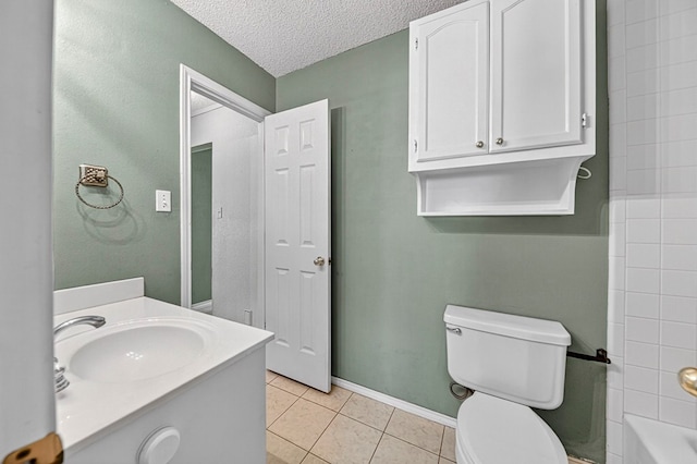 2209 Southampton Ln, Midland, TX 79705 - full bath with vanity, tile patterned flooring, a textured ceiling, and bathtub / shower combination