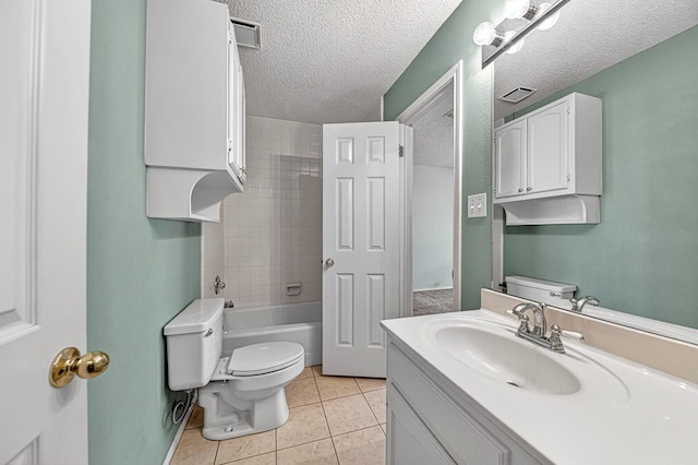 2209 Southampton Ln, Midland, TX 79705 - bathroom with vanity, a textured ceiling, and tile patterned flooring