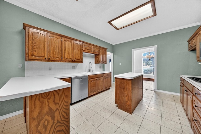 2209 Southampton Ln, Midland, TX 79705 - kitchen featuring stainless steel dishwasher, backsplash, a peninsula, ornamental molding, and light countertops
